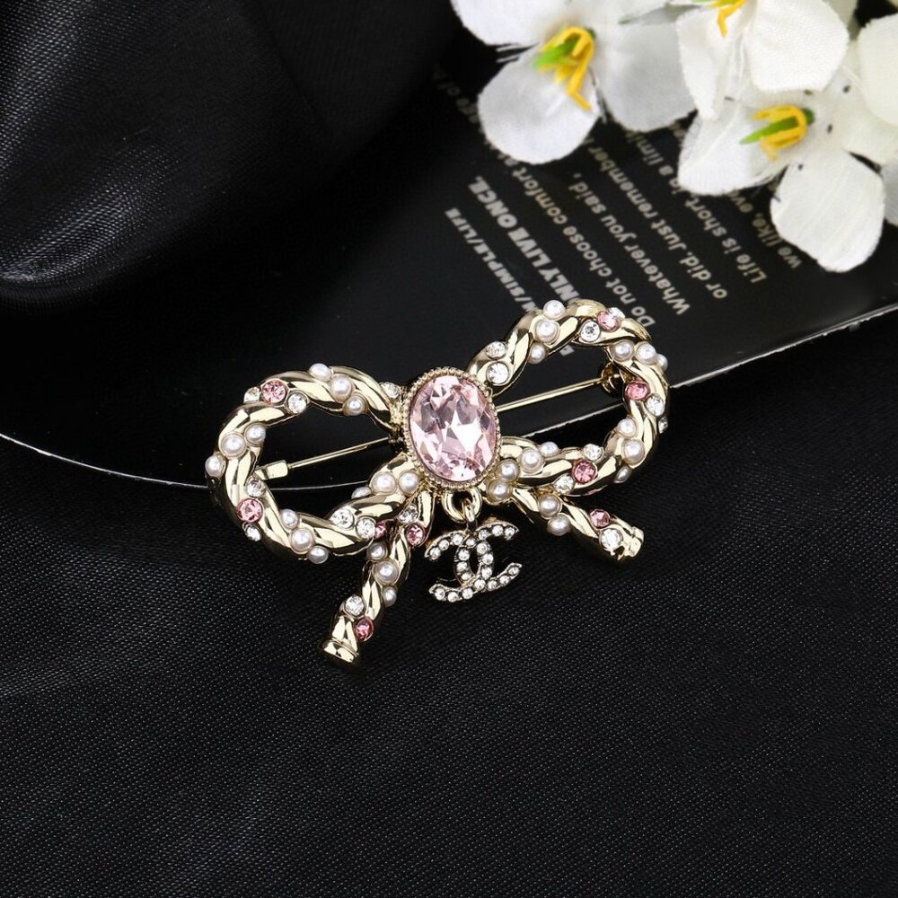 Chanel brooches